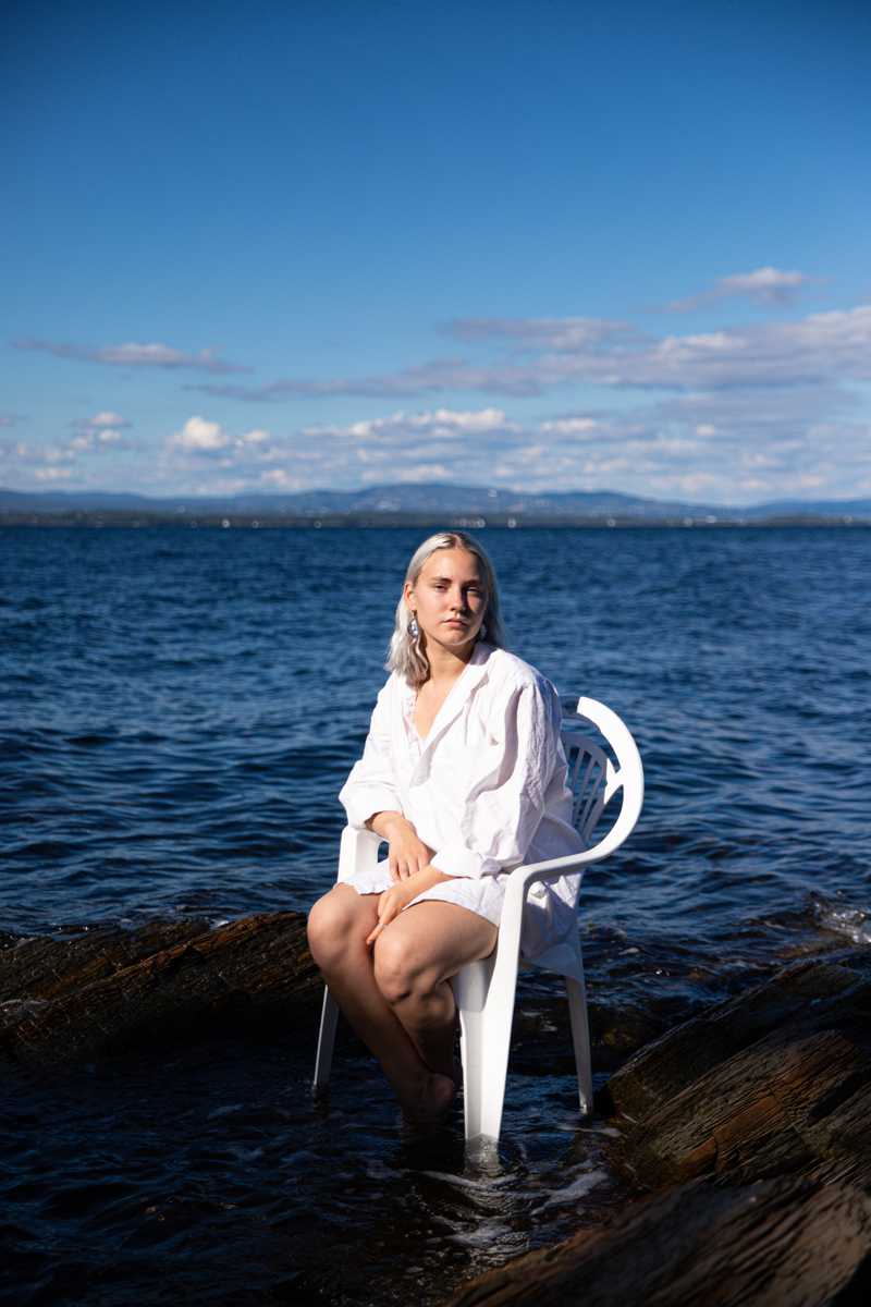 girl in chair in ocean